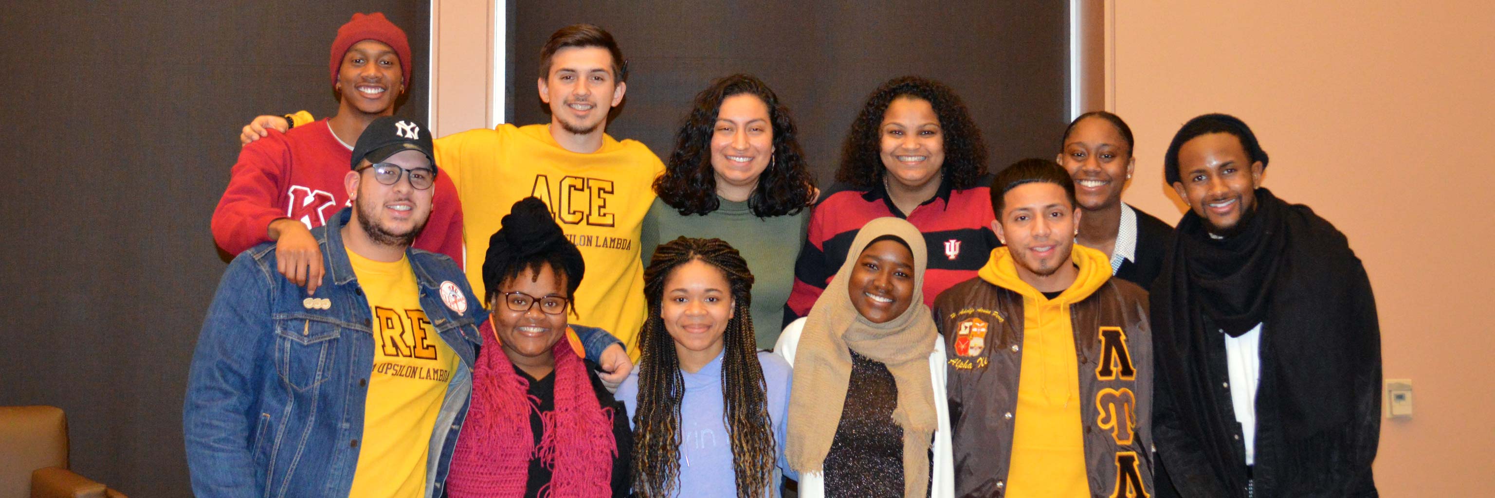 A group picture of several students smiling.